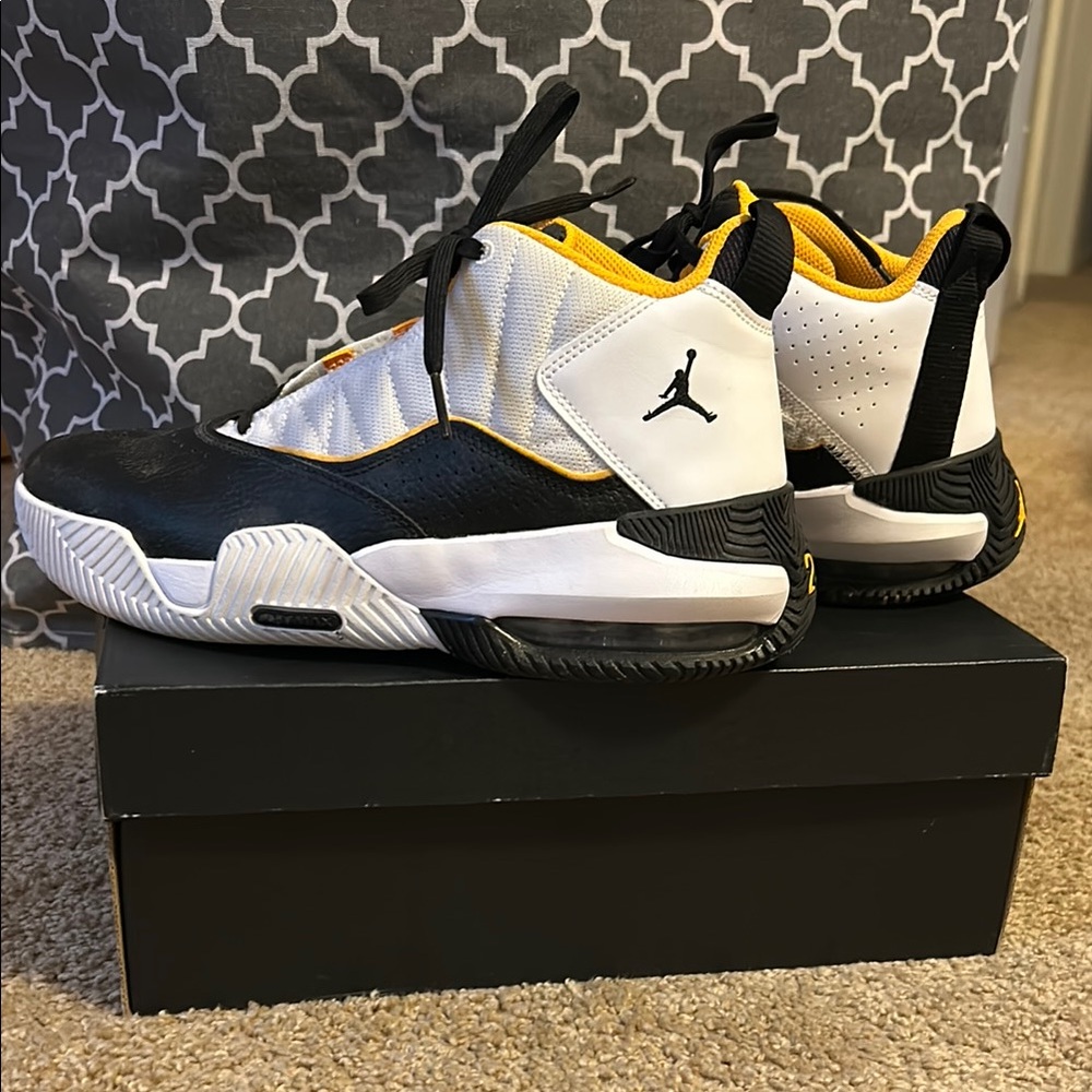 Like New Jordan Kids' Black and White Sneakers. Only worn once in the backyard